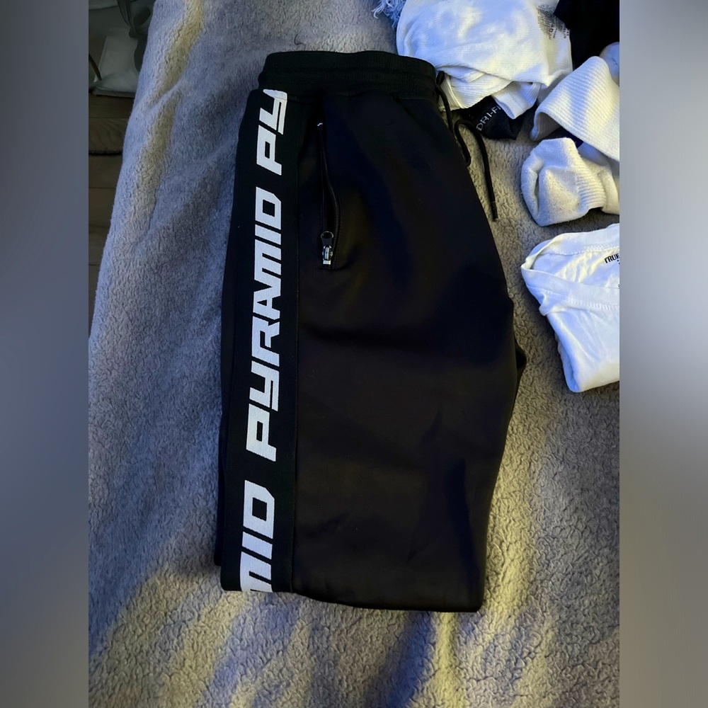 Black Pyramid sweater and pants
